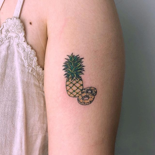Pineapple tattoo meaning and symbolism 