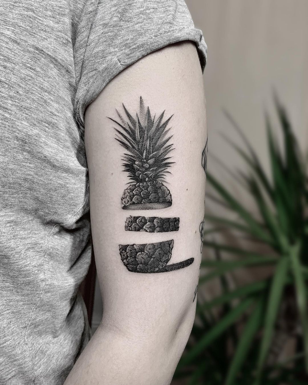 pineapple tattoo in the arm