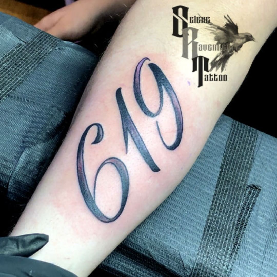 619 tattoo in the forearm