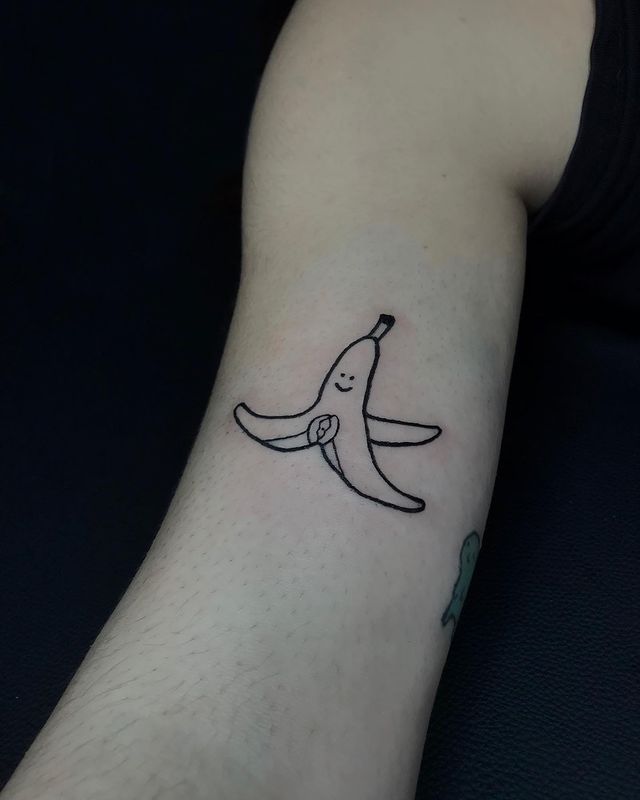 banana peel arm tattoo