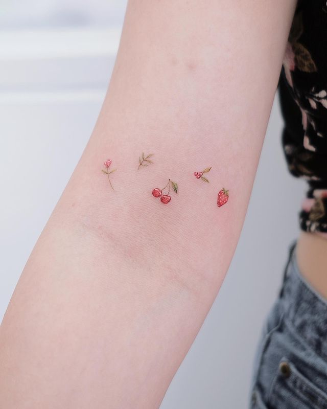 very tiny cherry tattoo