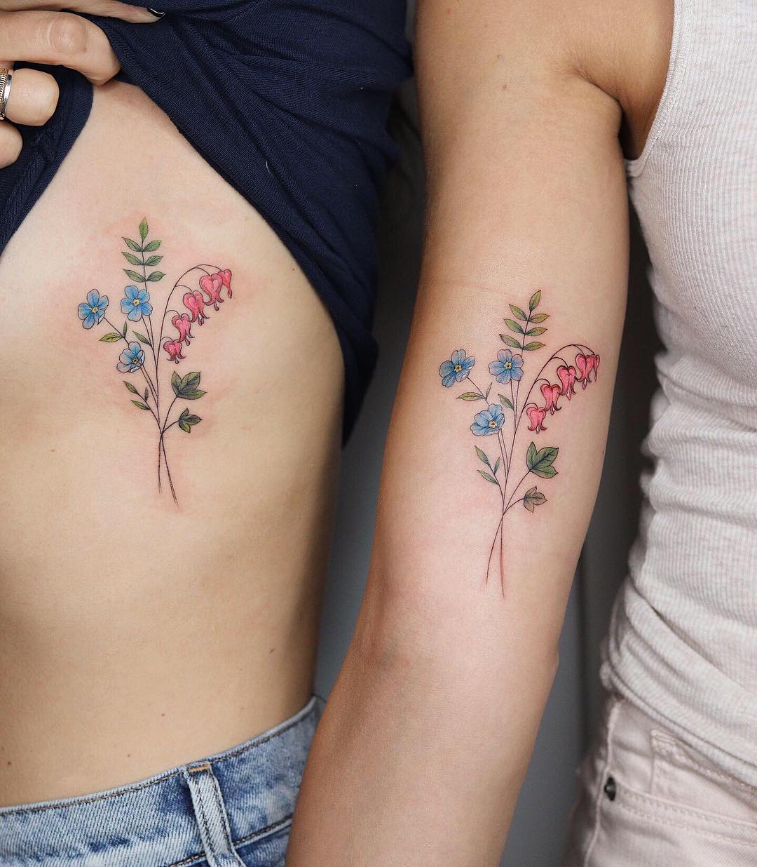 Wildflower Tattoos on arm and ribcage