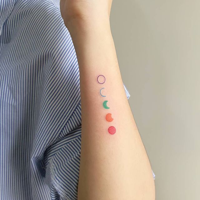 cute colorful moon phases tattoo