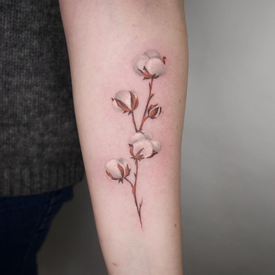 cotton plant arm tattoo