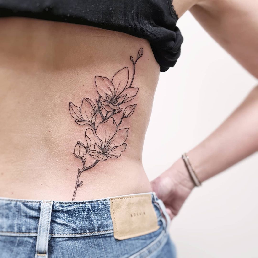 Magnolia back tattoo