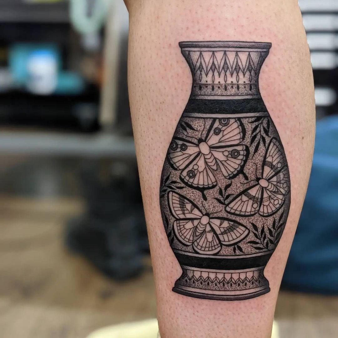 Vase leg tattoo