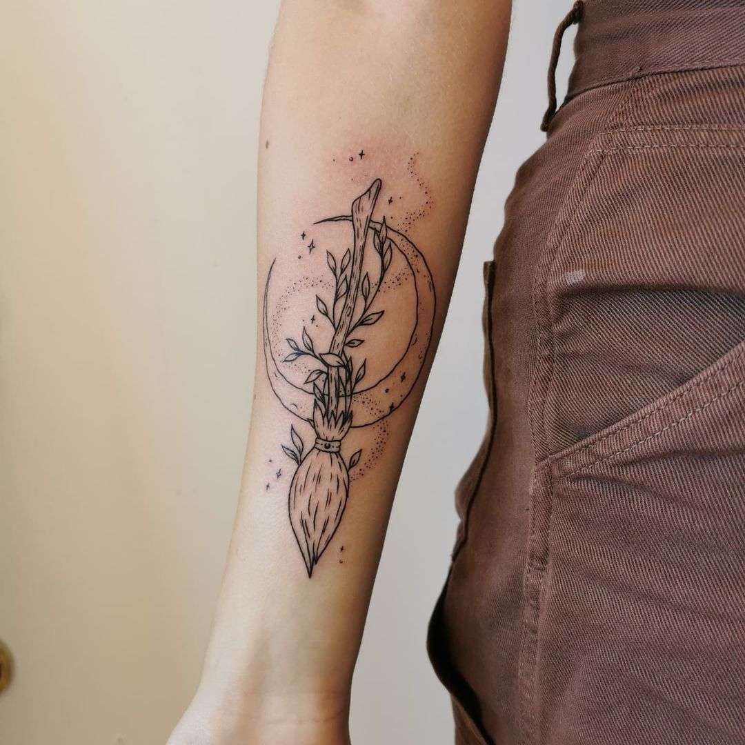 broomstick hand tattoo 