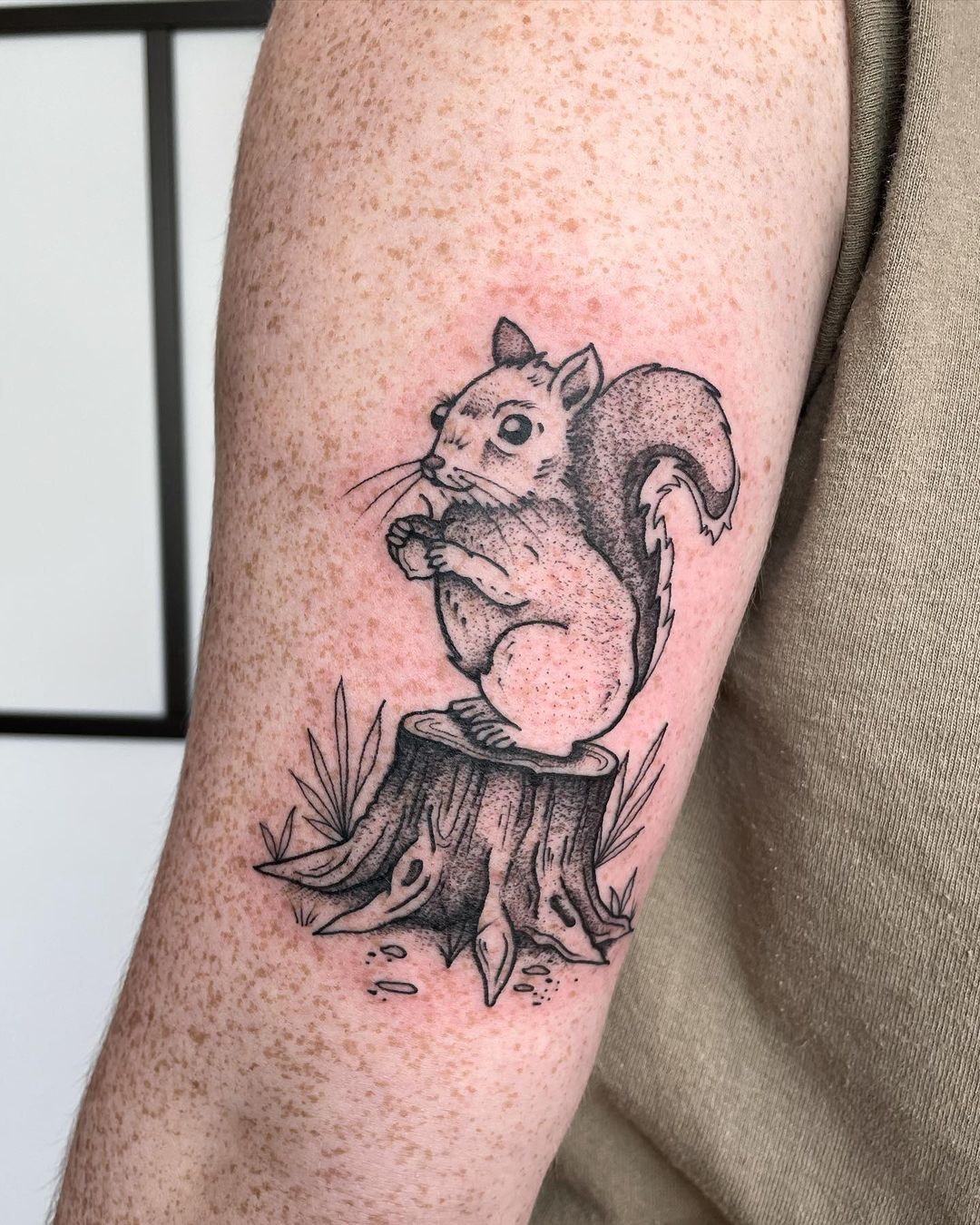Squirrel arm tattoo