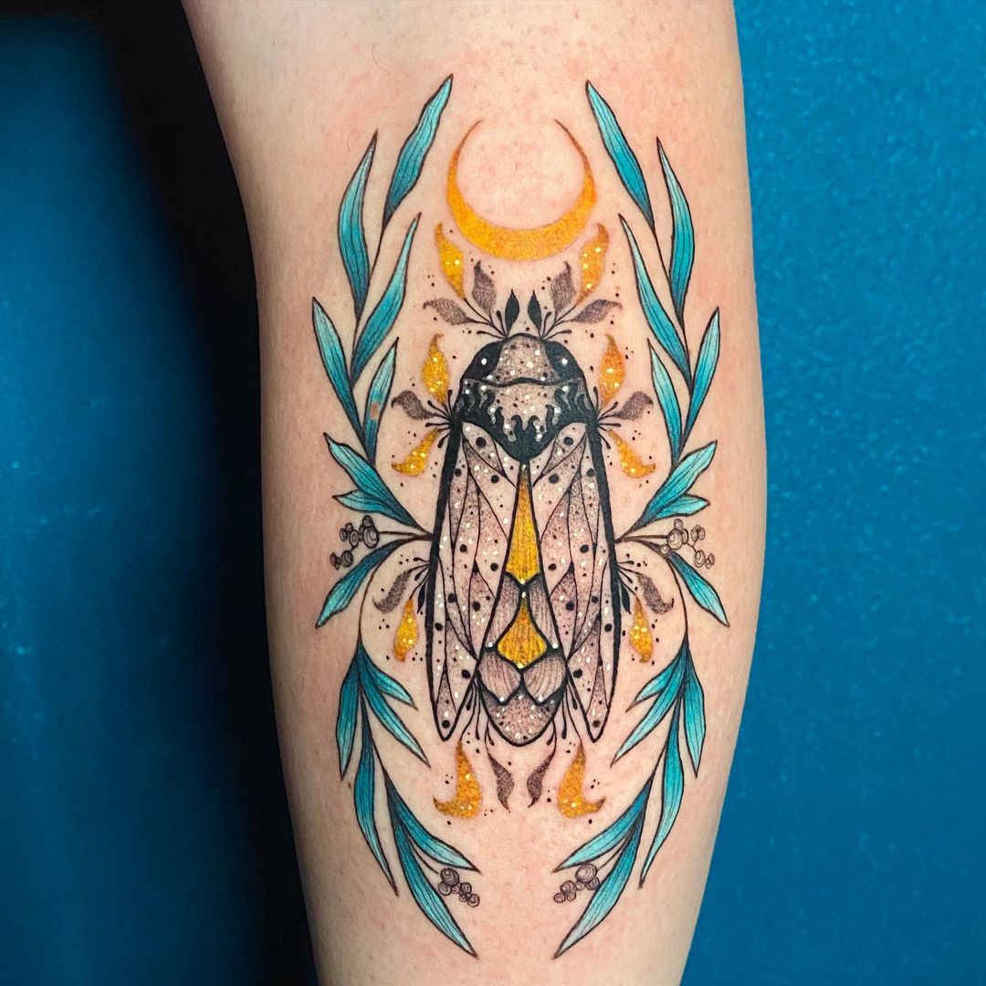 Cicada arm tattoo