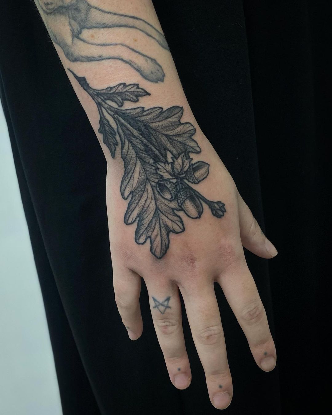 Acord hand tattoo
