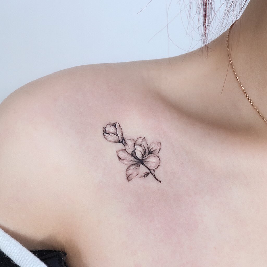 Magnolia chest tattoo