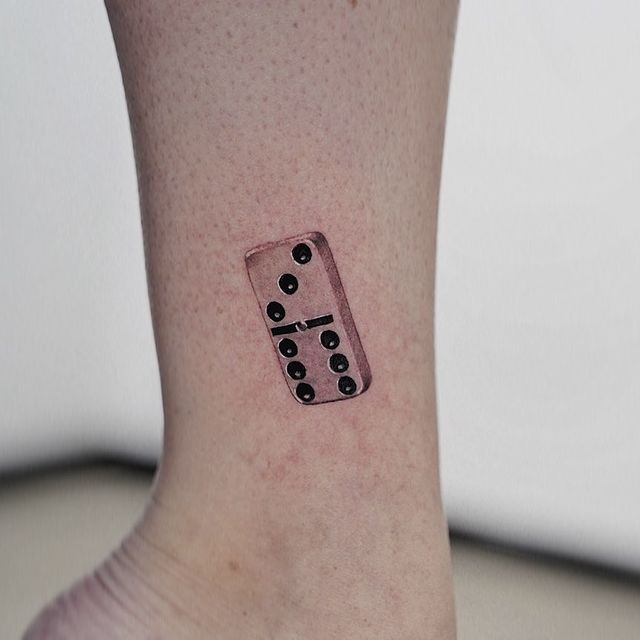 realistic domino tattoo