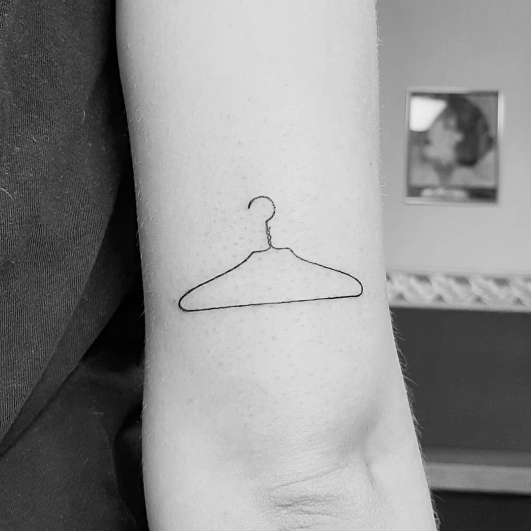 Hanger Tattoo Meaning and symbolism - MyTatouage.com