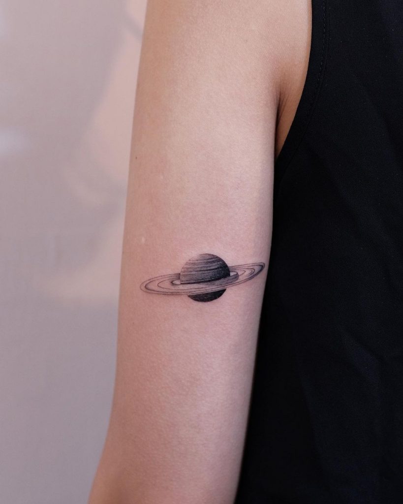 Saturn arm tattoo