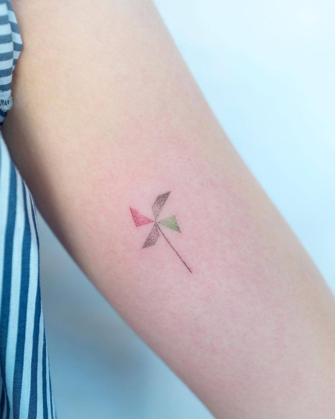 Pinwheel tattoo meaning and symbolism 