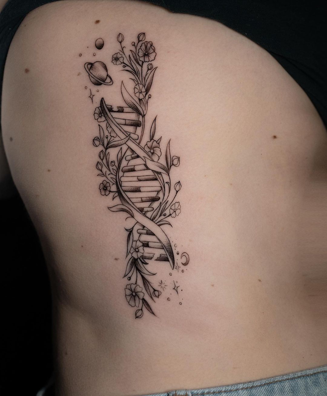 DNA rib tattoo