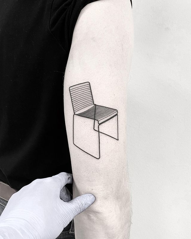 desk chair arm tattoo