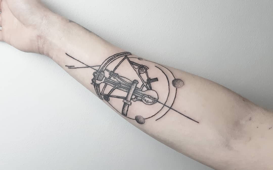 sextan arm tattoo