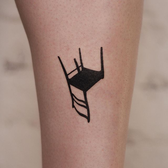 upside down chair tattoo 