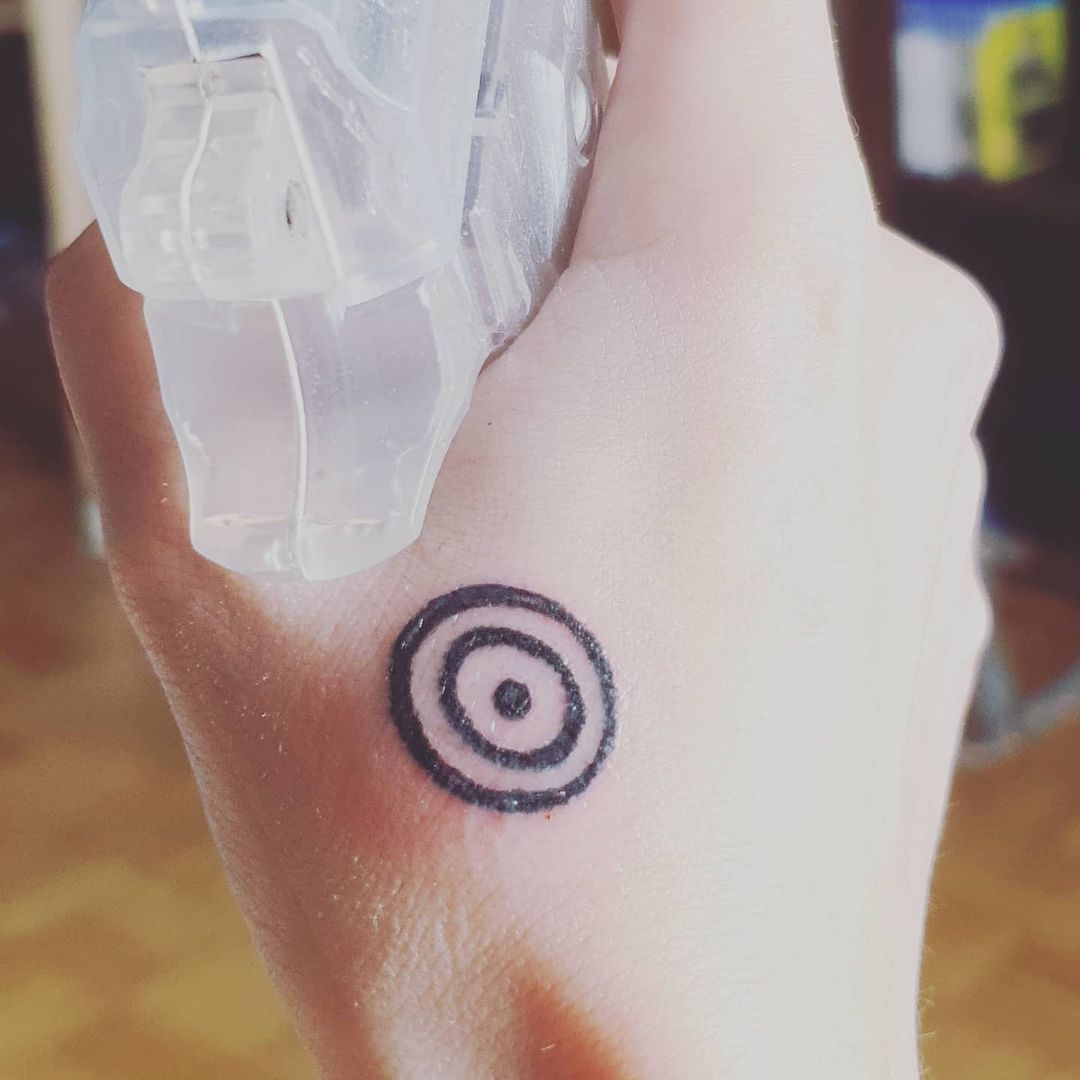 bullseye hand tattoo