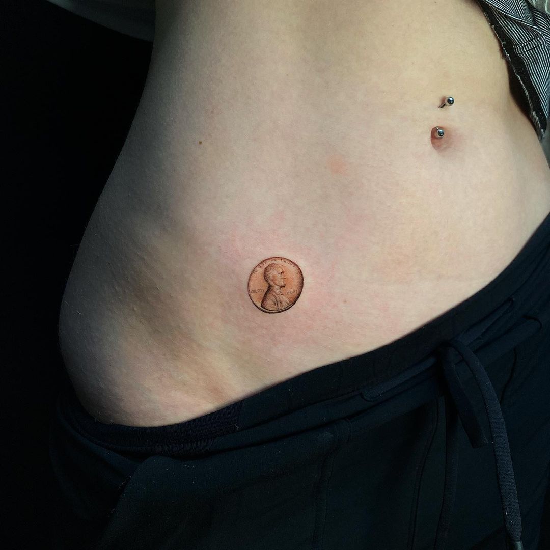 penny hip tattoo