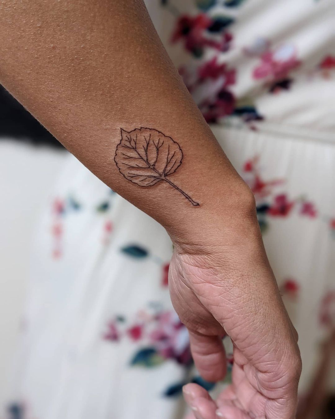 aspen leaf arm tattoo