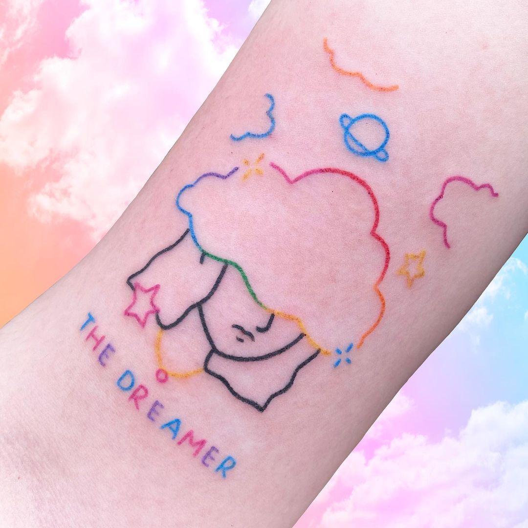 dreamer arm tattoo