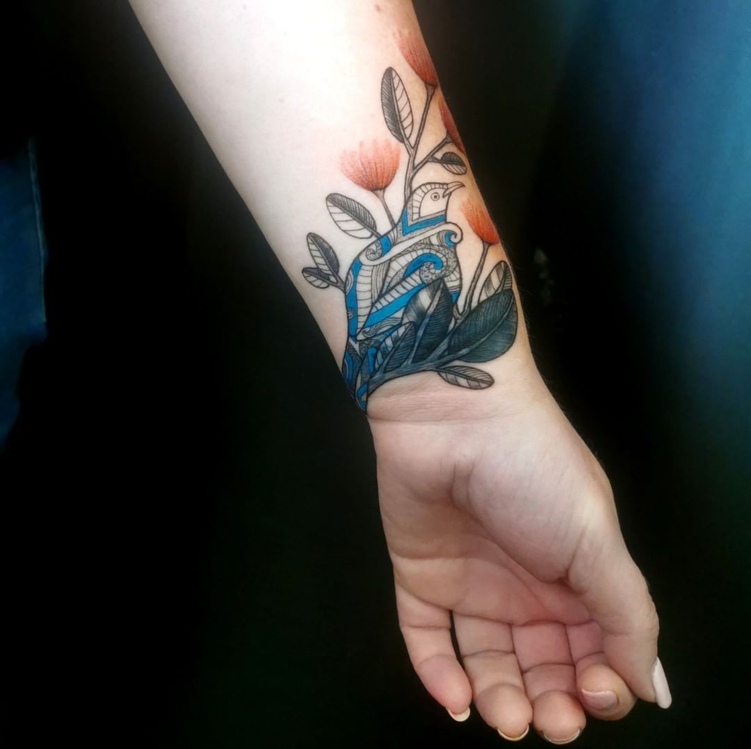 Tui bird wrist tattoo