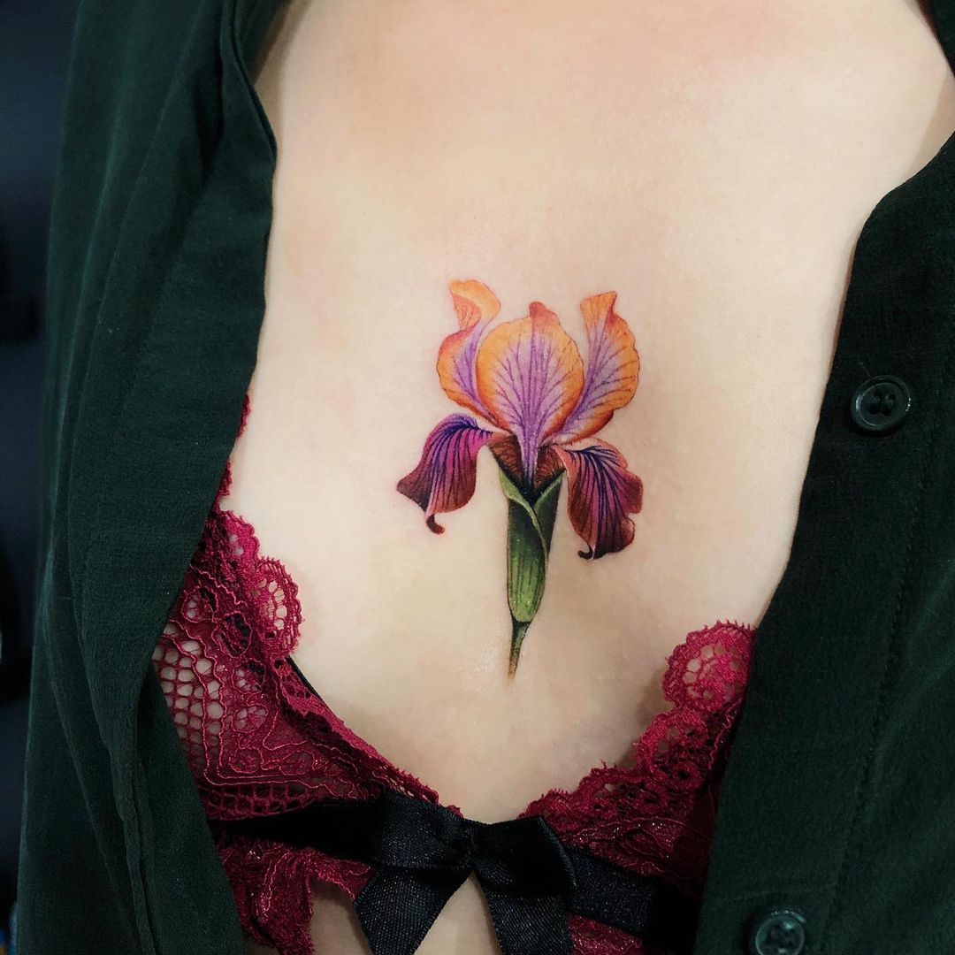 Iris flower chest tattoo