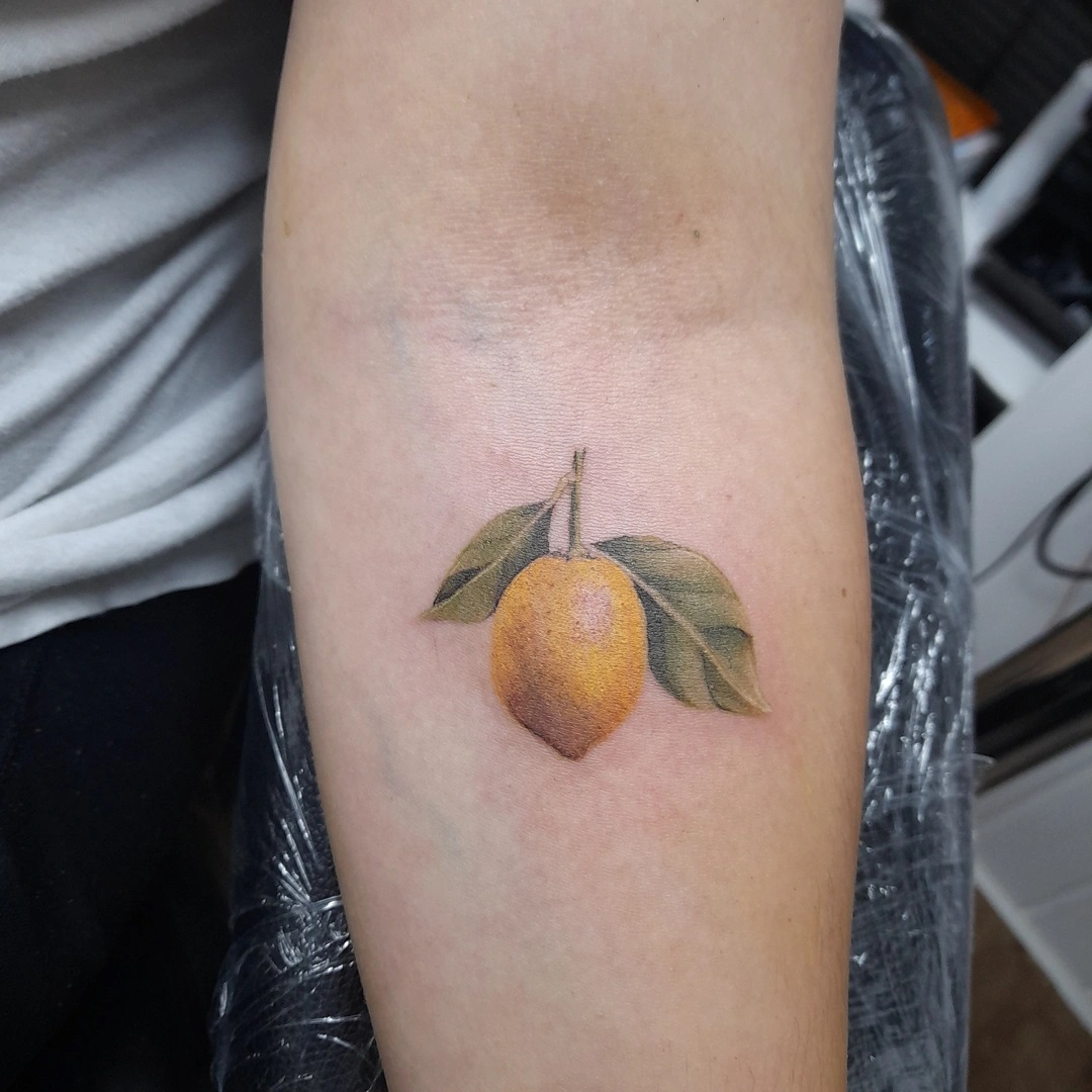 Lemon arm tattoo