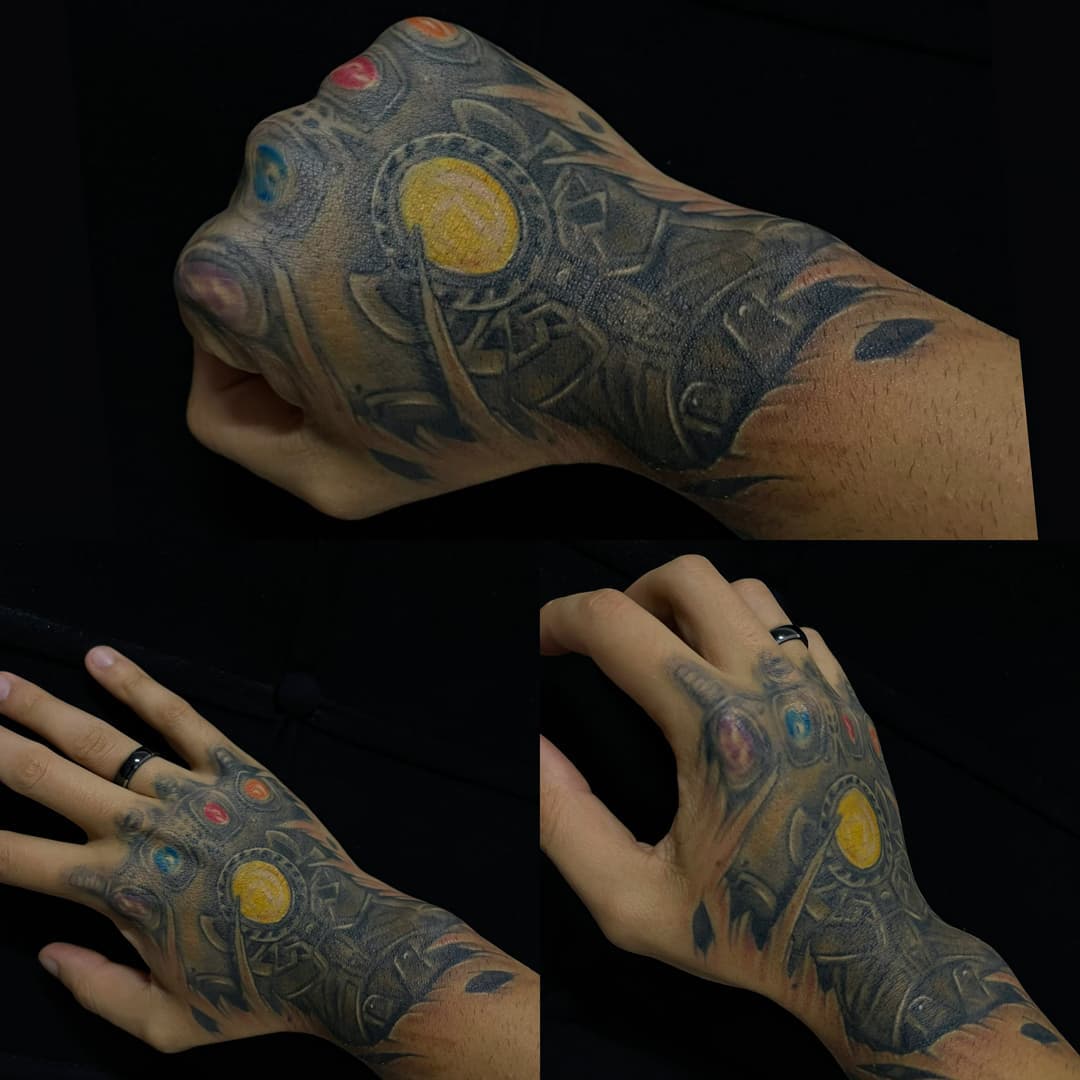 Infinity Gauntlet hand tattoo
