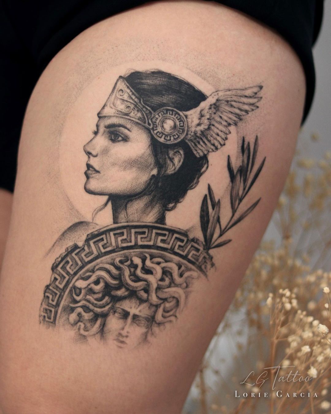Athena leg tattoo