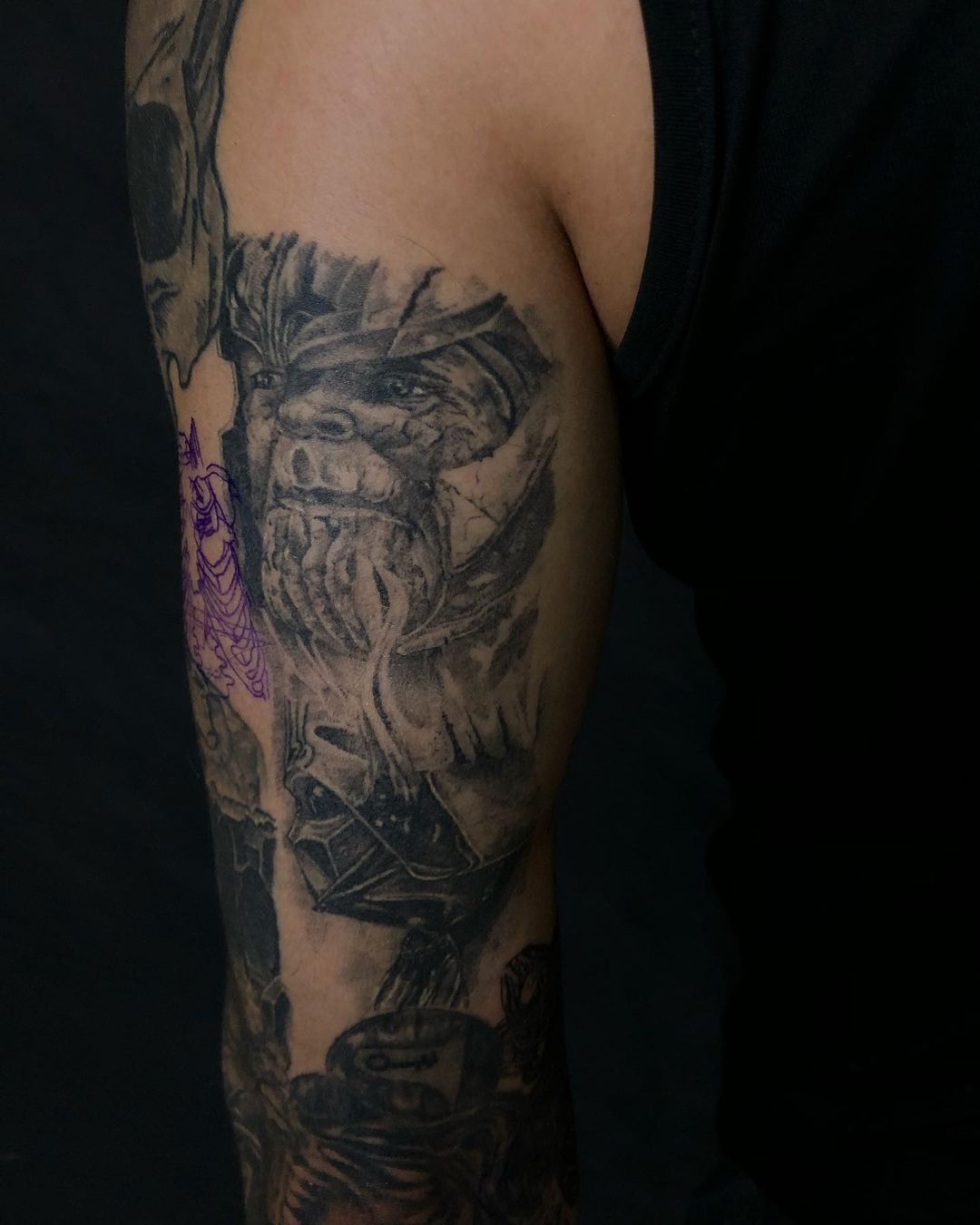 Thanos arm tattoo