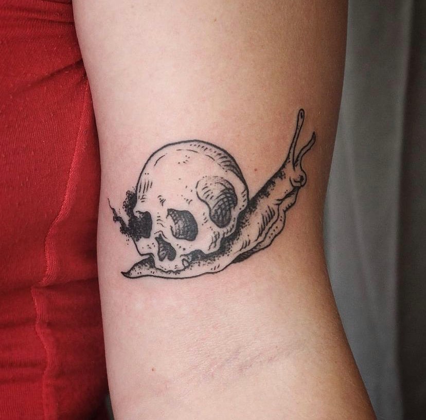 skull snail tattoo