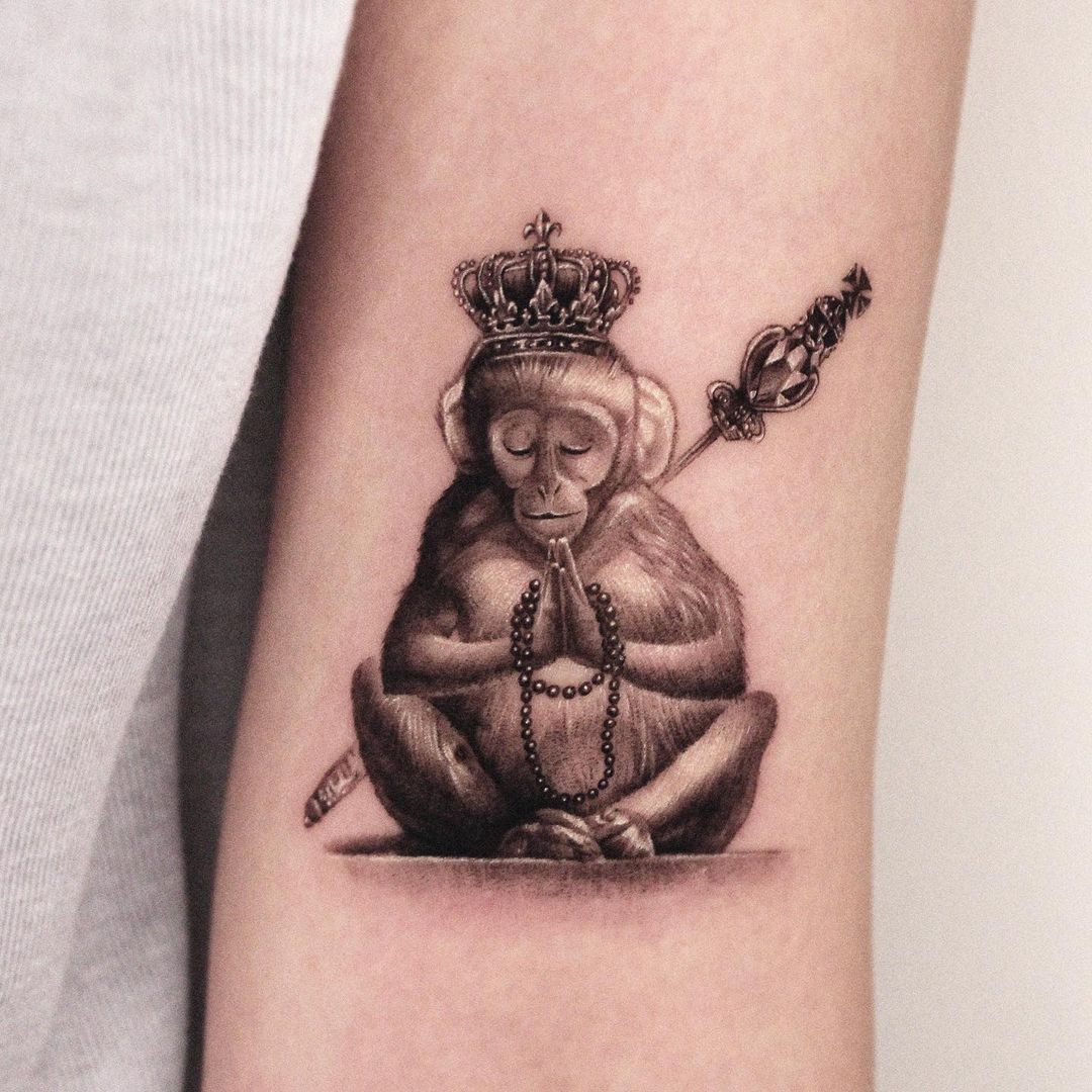 Monkey arm tattoo