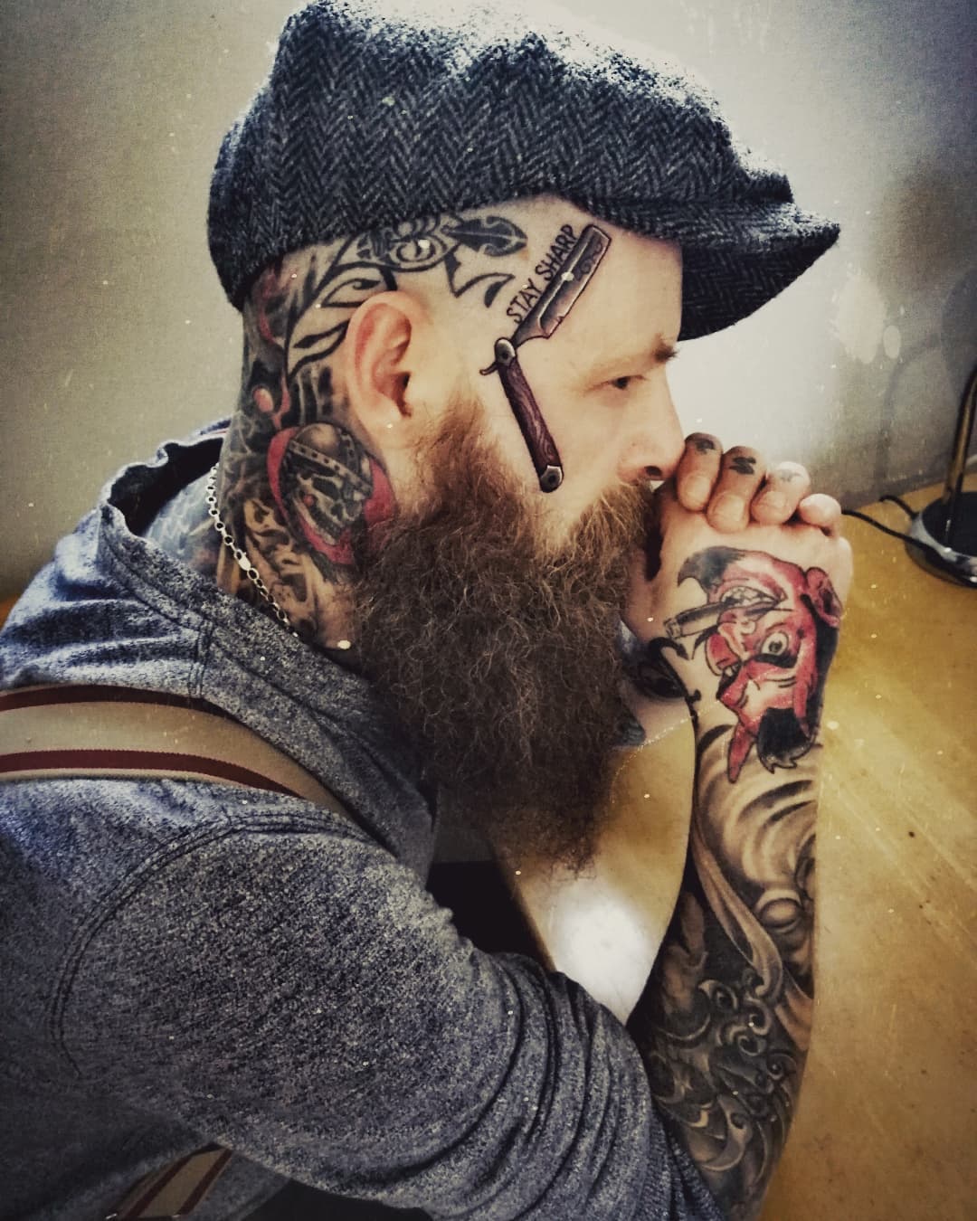 Razor head tattoo
