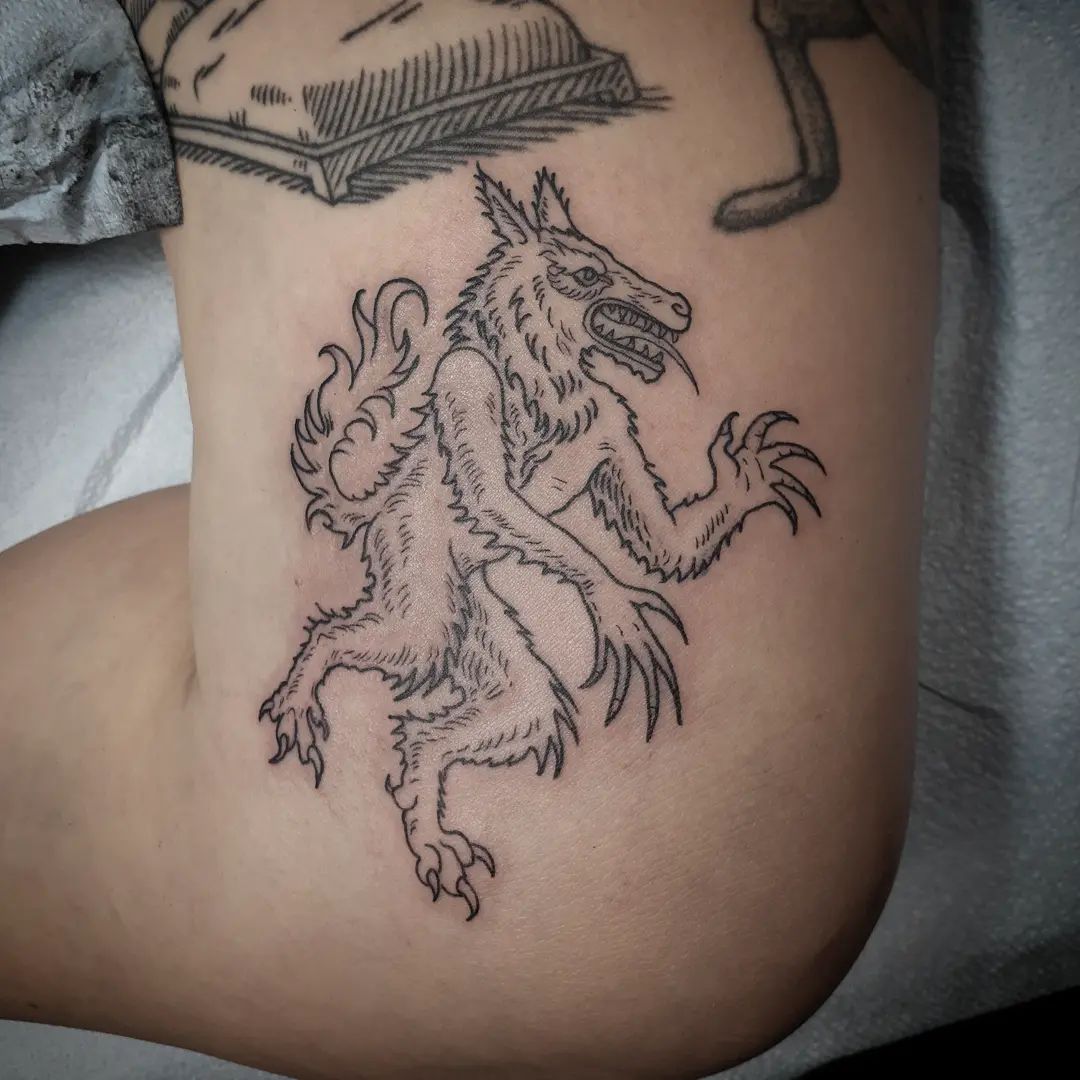 werewolf arm tattoo