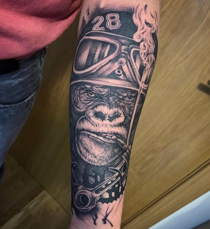 tattoo of an ape in the arm