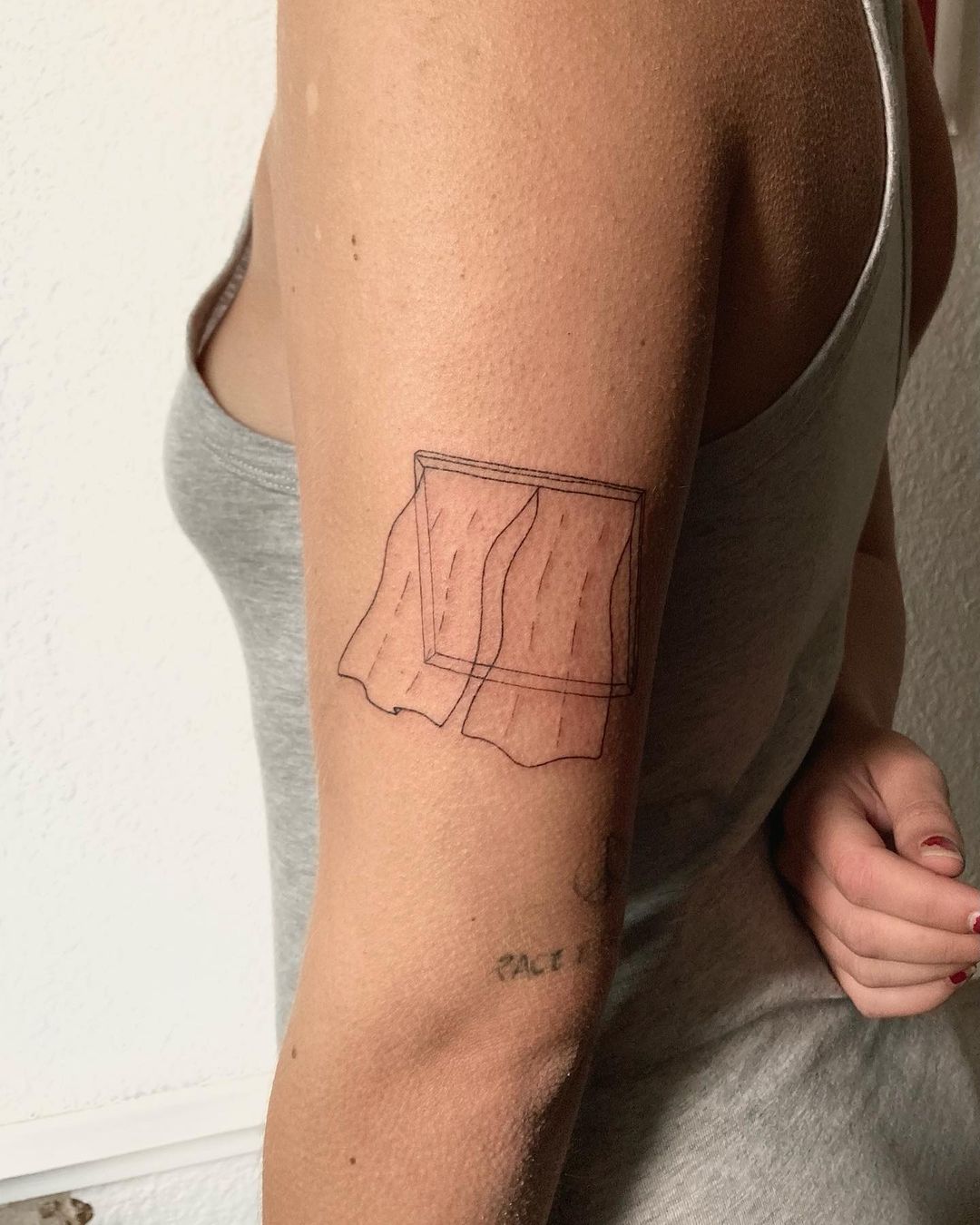 window arm tattoo