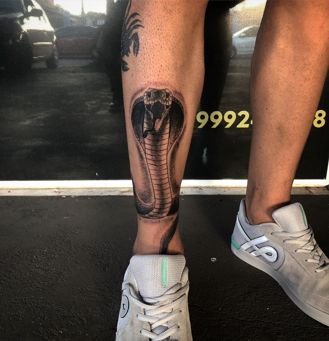 Cobra leg tattoo