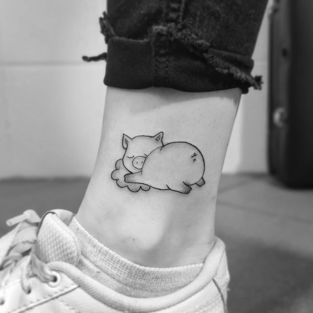 lazy pig ankle tattoo