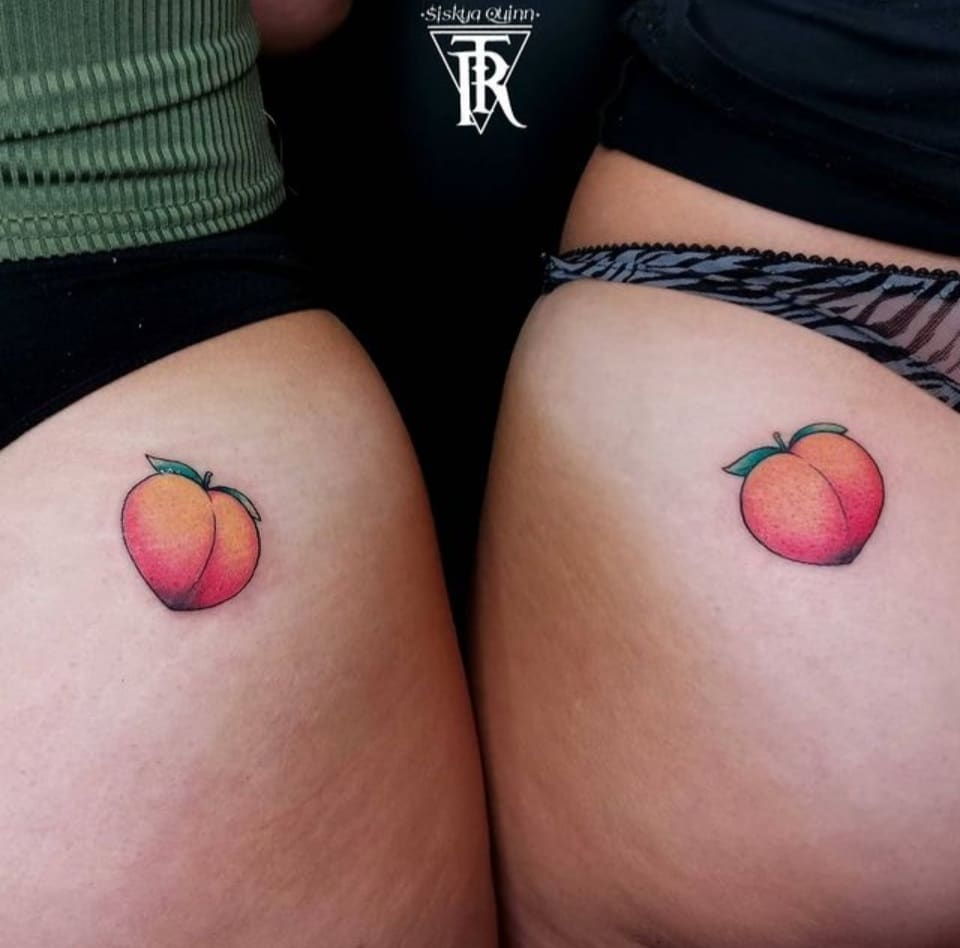 matching peach hip tattoos