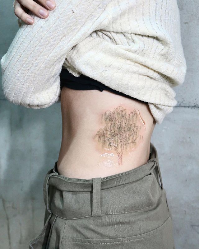 willow tree rib tattoo