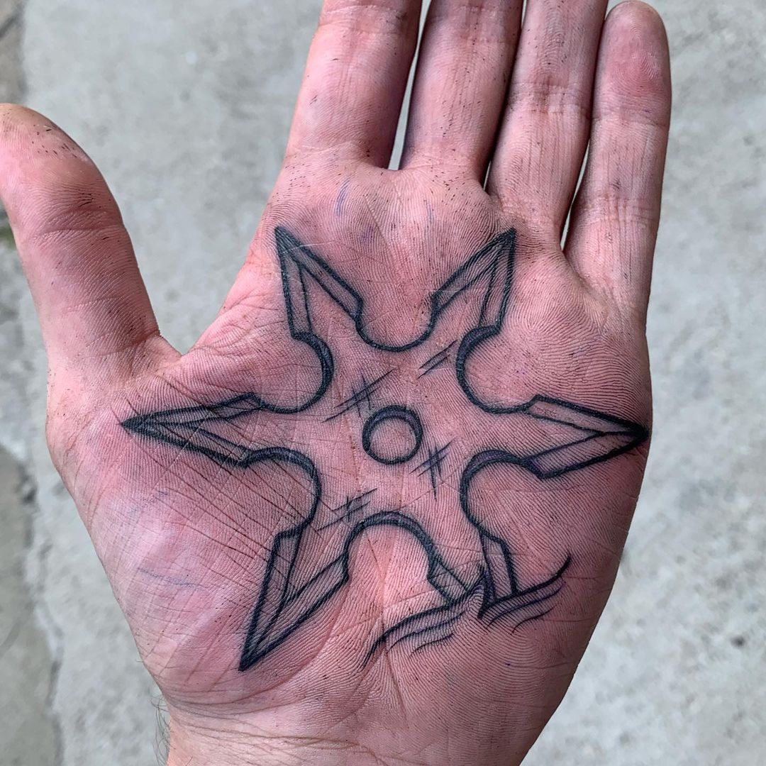 Shuriken hand tattoo