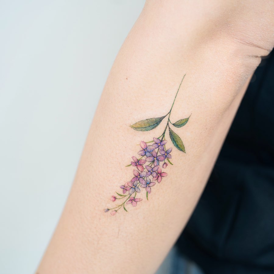lilac arm tattoo
