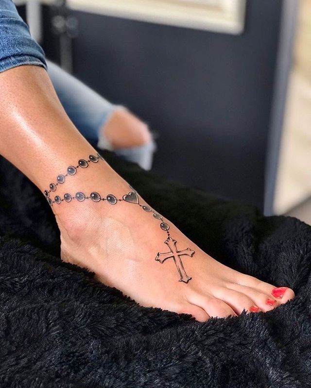 Rosary foot tattoo 