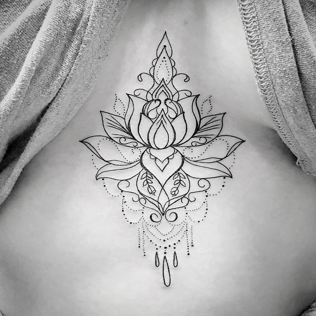 Lotus chandelier chest tattoo