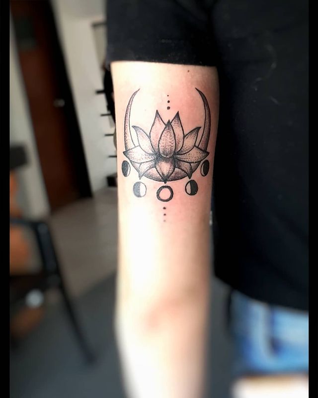 lotus and moon arm tattoo 
