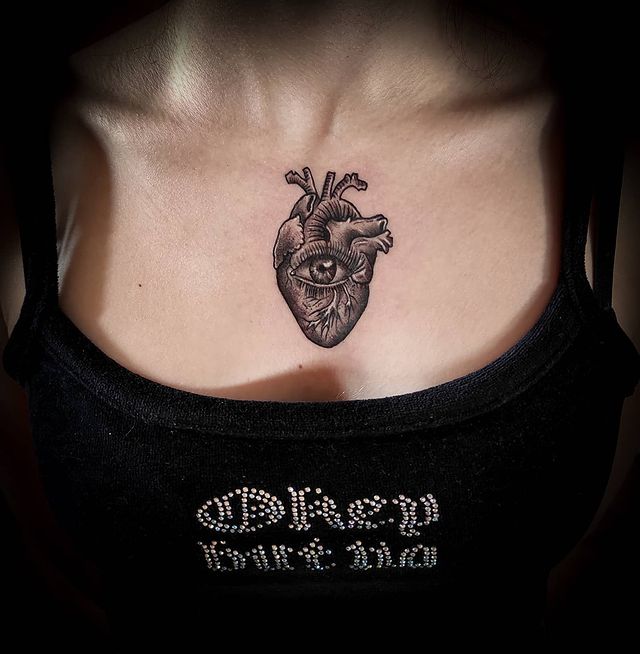 Heart With An Eye chest Tattoo 