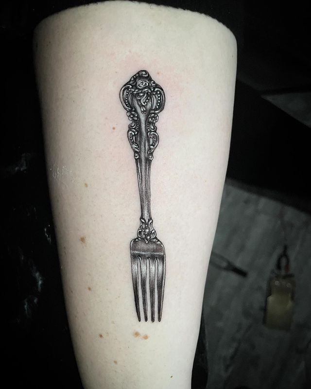 fork arm tattoo 